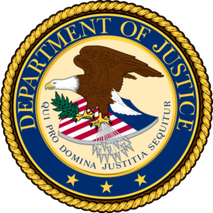 A picture of the department of justice seal.